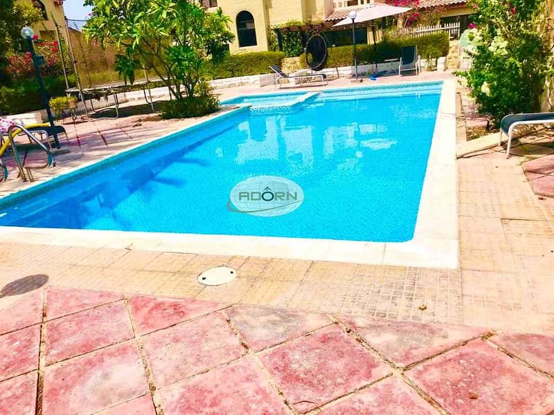 Very nice 4 bedroom compound villa with private garden shared pool umm suqiem