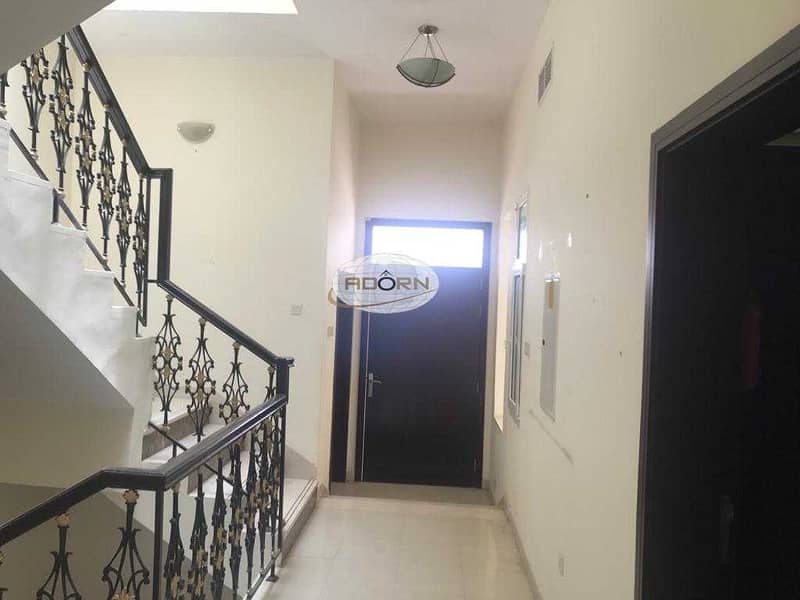 10 Very nice 4 bedroom plus maid compound villa with shared pool and gym in Al Barsha 1