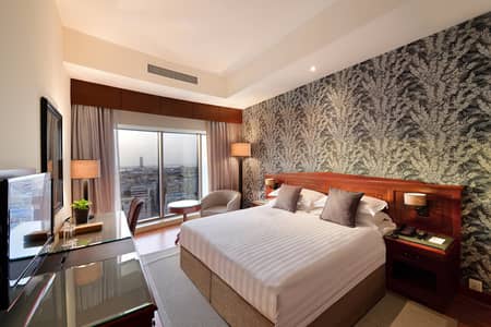 1 Bedroom Hotel Apartment for Rent in Bur Dubai, Dubai - All taxes inclusive / Dewa Inclsive/Car parking Incuisve/3 time Housekeeping service in a week.