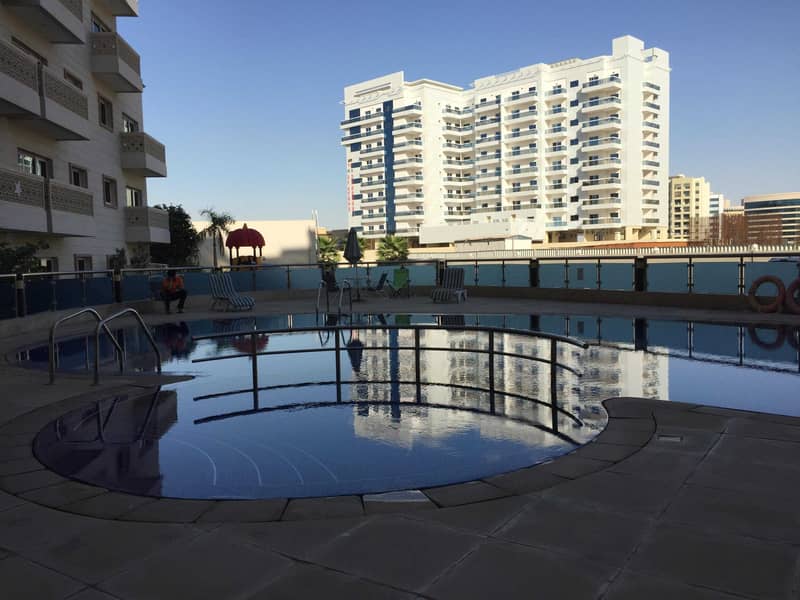 17 Upgraded 1BHK | Pool View | Next to Silicon Center