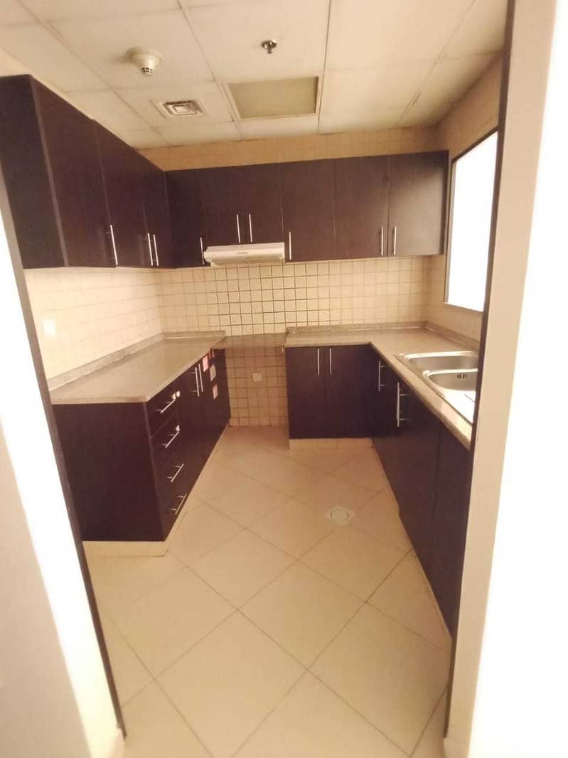 10 28K PAY 4 CHQ !!!LARGE  ONE BEDROOM WITH LARGE BALCONY + LUNDRY ROOM  AVAILABLE FOR RENT MAZAYA Q POINT LIWAN  DUBAI