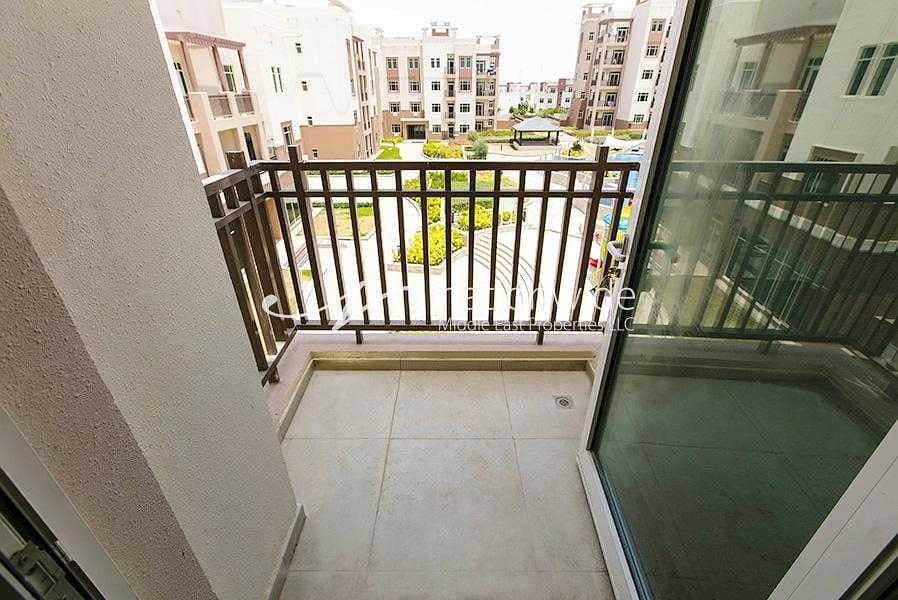 12 Lovingly Maintained Unit With Balcony & Pool View