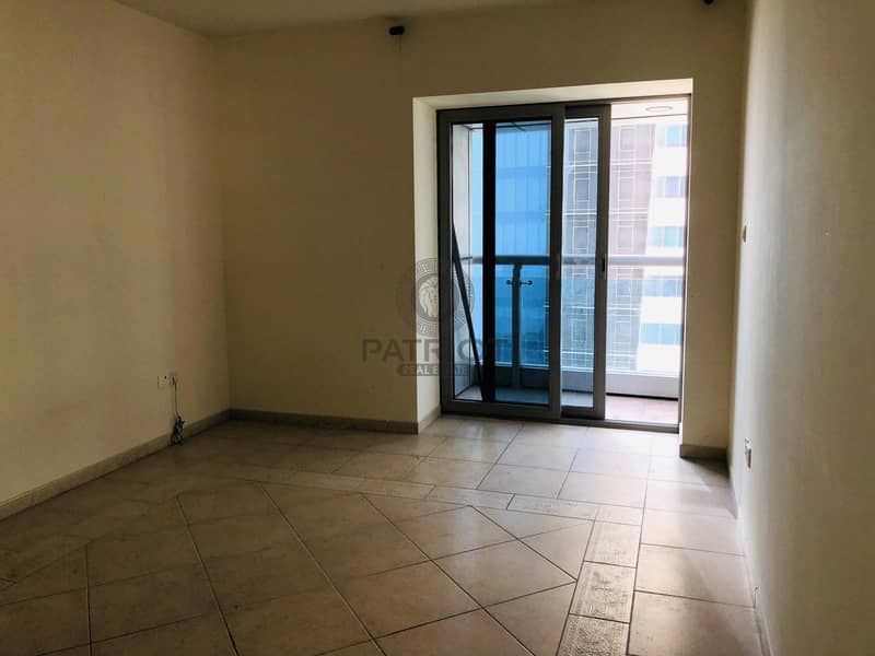 12 Partial Sea View l One Bedroom l Unfurnished l  High Floor