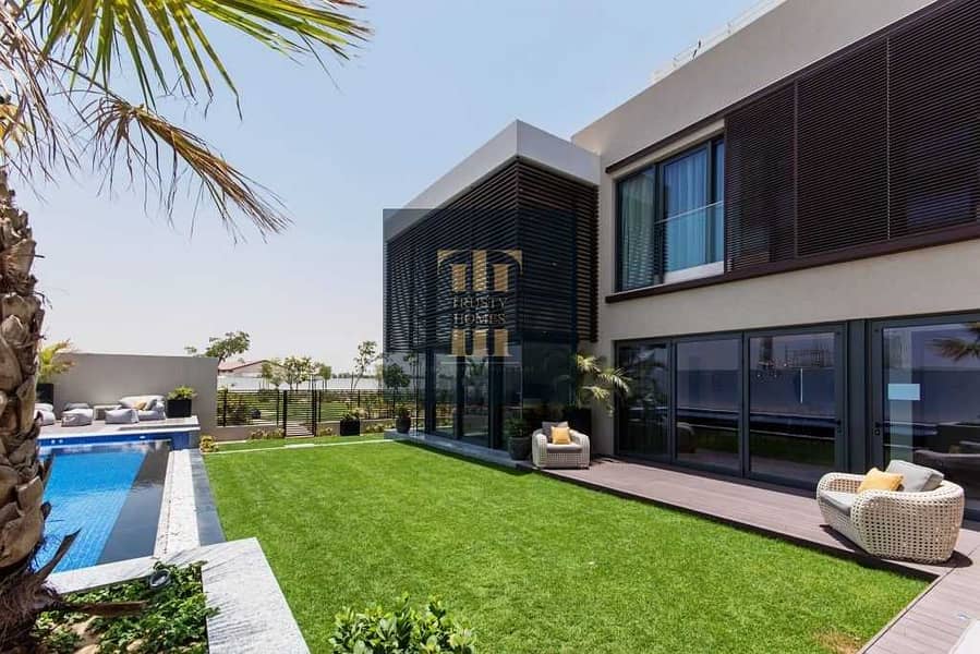 2 Own a villa with a natural panoramic view of the Dubai Water Canal