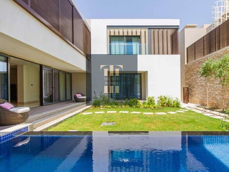 12 Own a villa with a natural panoramic view of the Dubai Water Canal