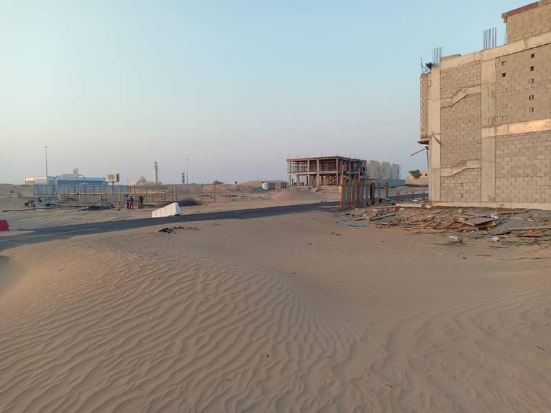 Land for sale yasmine Ajman Excellent site without registration fees