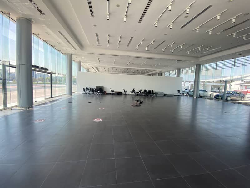 IDEAL FOR INDOOR SPORTS ACTIVITIES/120 PARKING/45000 SQFT LAND WITH 11000 SQFT BUILTUP SHOWROOM