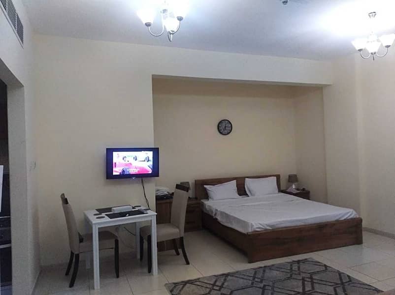 7 HURRY UP !!  FULLY FURNISHED STUDIO WITH BALCONY FOR RENT IN EMIRATES CLUSTER  JUST 19000