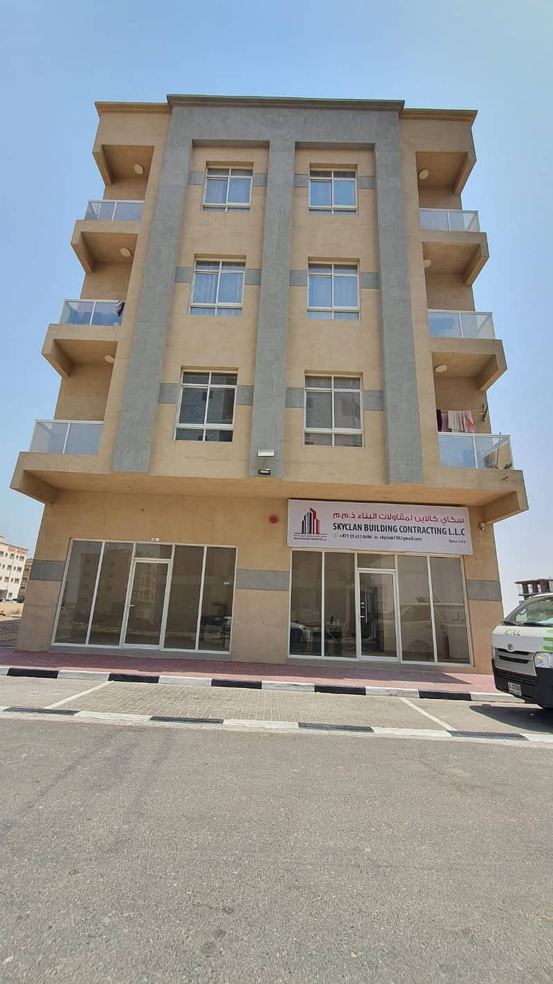 For sale a building in Al Aaliyah, Ajman, ground and 3 on the street