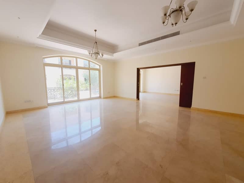 2 Very spacious 5bhk compound villa with study & shared pool+gym in umm suqaim 1 rent is 240k