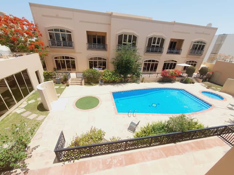 18 Very spacious 5bhk compound villa with study & shared pool+gym in umm suqaim 1 rent is 240k