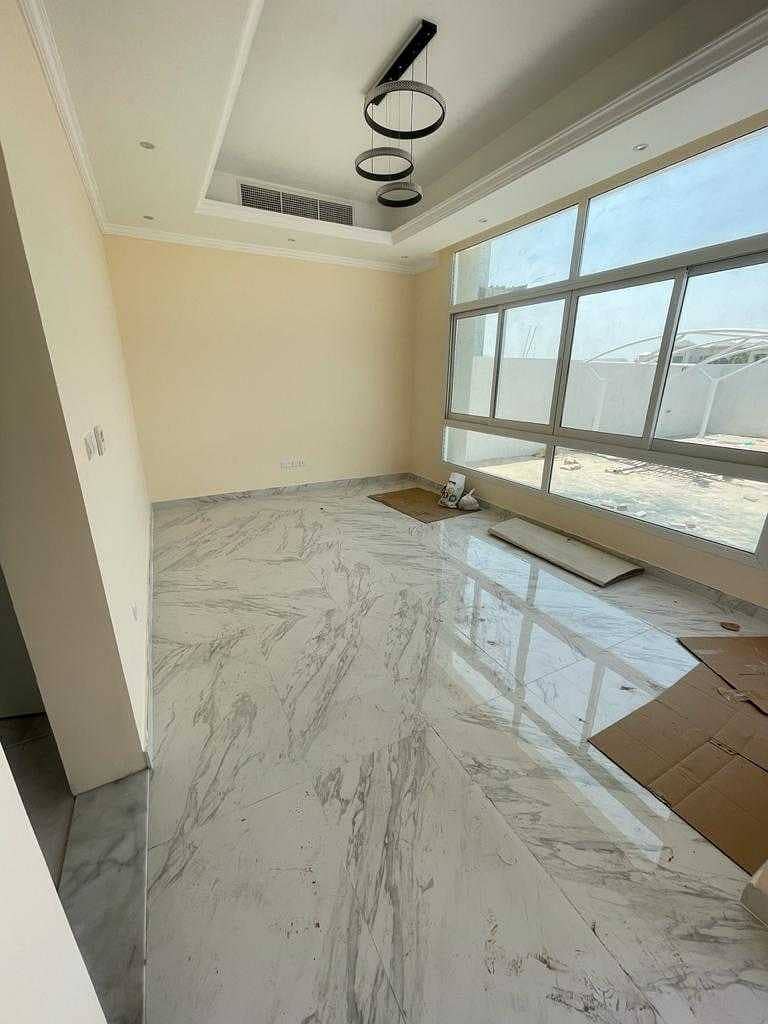 Brand new villa for rent in Al khawaneej (4 bed room + majlis +hall + parking + garden laundry room + kitchen +dinning room + maidsroom)