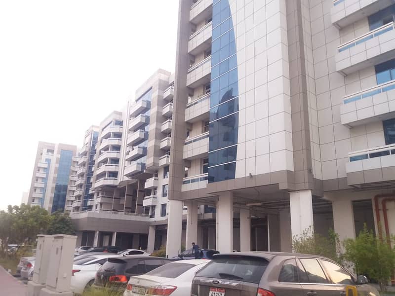 SPECIOUS ONE BEDROOM WITH BALCONY IN 30K BY 4 CHEQUES IN AXIS2 IN SILICON OASIS