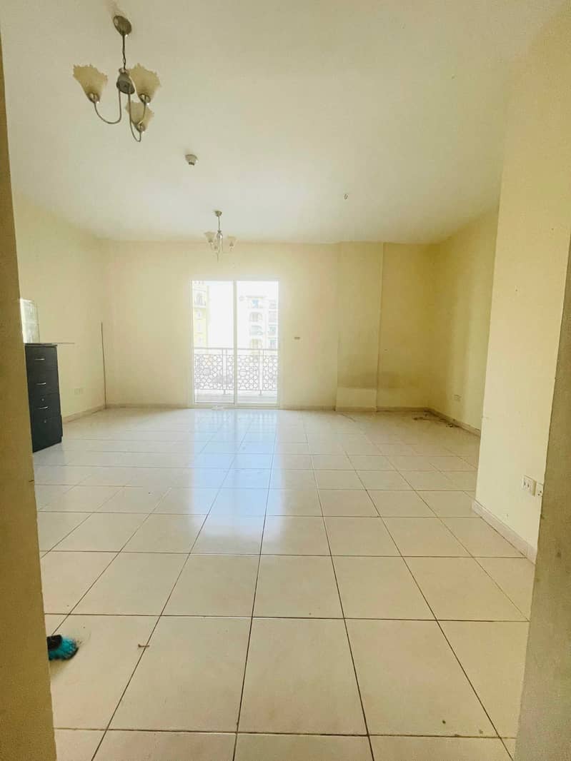 Ready To Move In Large Studio With Balcony Open View In Emirates Cluster