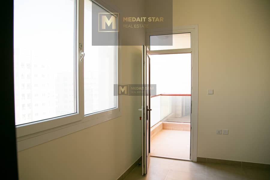 8 2 BHR Al Warqaa 1 - spacious room with balcony