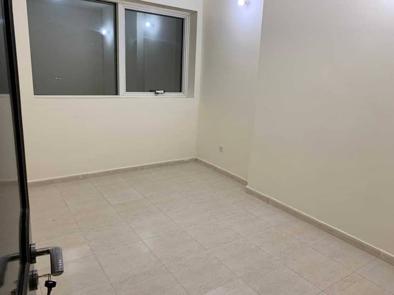 26 with lowest price in Abu Dhabi flat for rent 2 bedrooms with 2 bathrooms and very big living room and elegant kitchen