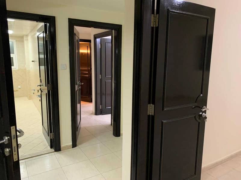 60 with lowest price in Abu Dhabi flat for rent 2 bedrooms with 2 bathrooms and very big living room and elegant kitchen