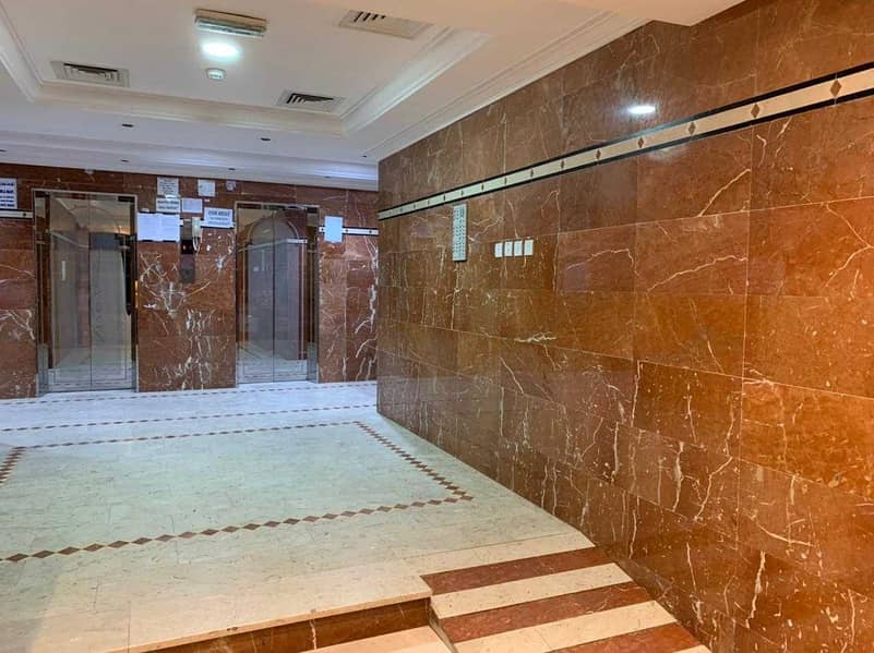 71 with lowest price in Abu Dhabi flat for rent 2 bedrooms with 2 bathrooms and very big living room and elegant kitchen