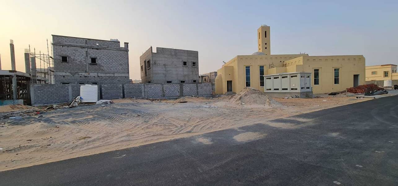Owns land in Al Zahia, Al Maha Falaj project, on the street, adjacent to the mosque
