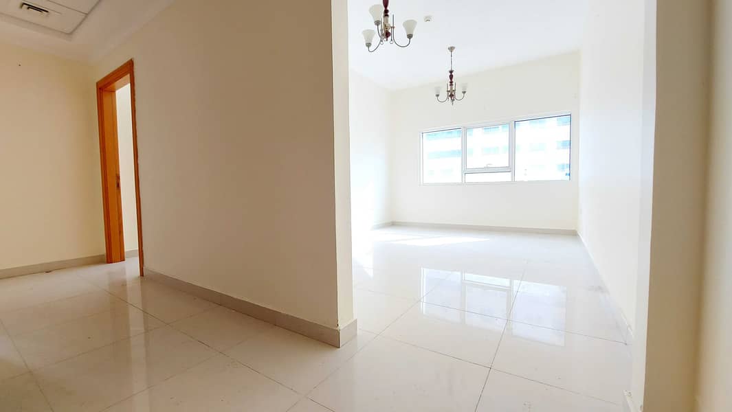 12 Cheques | 1 Month Free | Spacious 1 Bedroom | Covered Parking | New Building | Balcony | Open View | 28,000/- Yearly