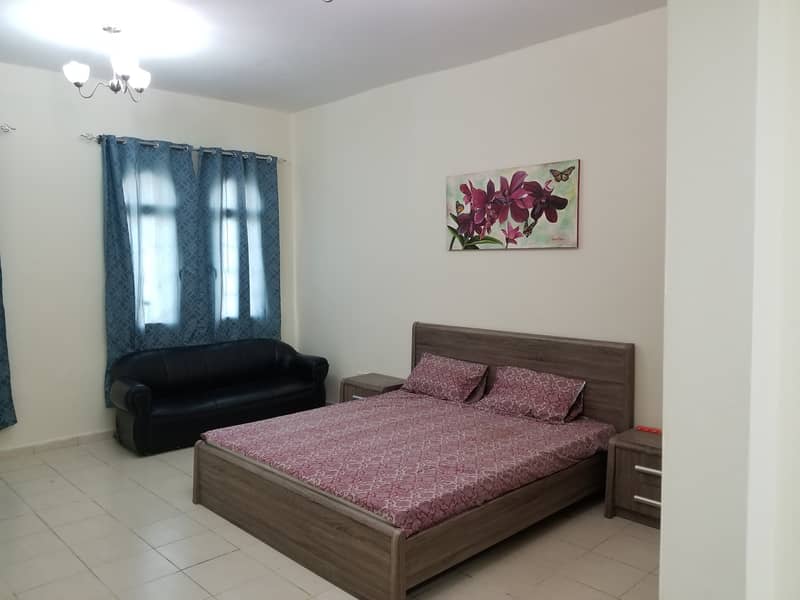 FURNISHED STUDIO AVAILABLE FOR RENT WITH BALCONY IN SPAIN CLUSTER Monthly 2800/- Aed