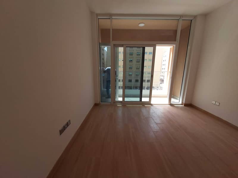 Brand new 1bhk apartment available only in 33k with parking wardrobes and balcony in New Muwaileh Sharjah