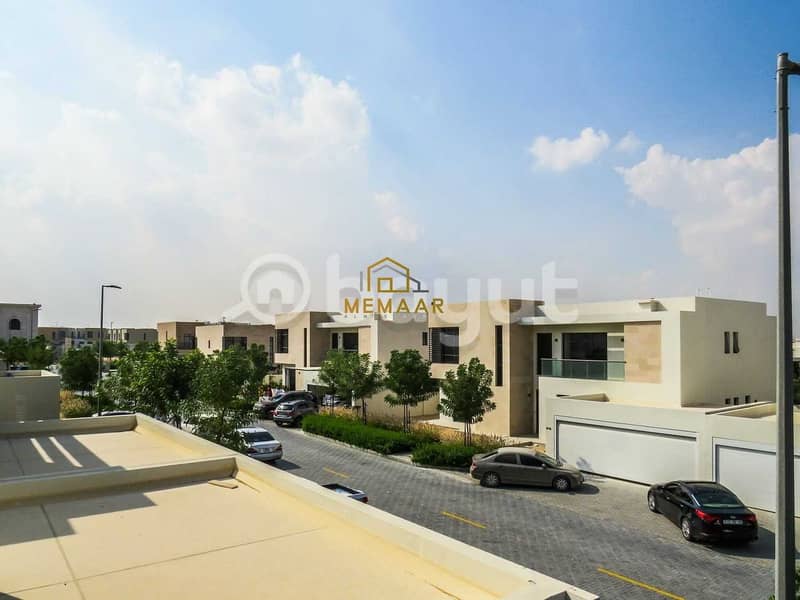 Without lifetime service fees, own a ready-made 4-bedroom villa in the heart of Sharjah, steps away from Dubai