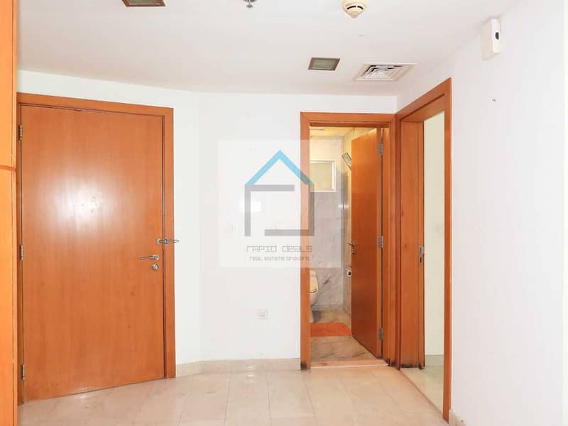 8 Well maintained 1BR facing SZR @ Madina Tower