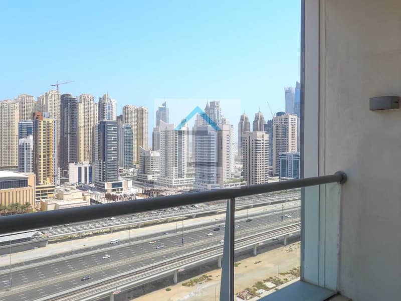 16 Well maintained 1BR facing SZR @ Madina Tower