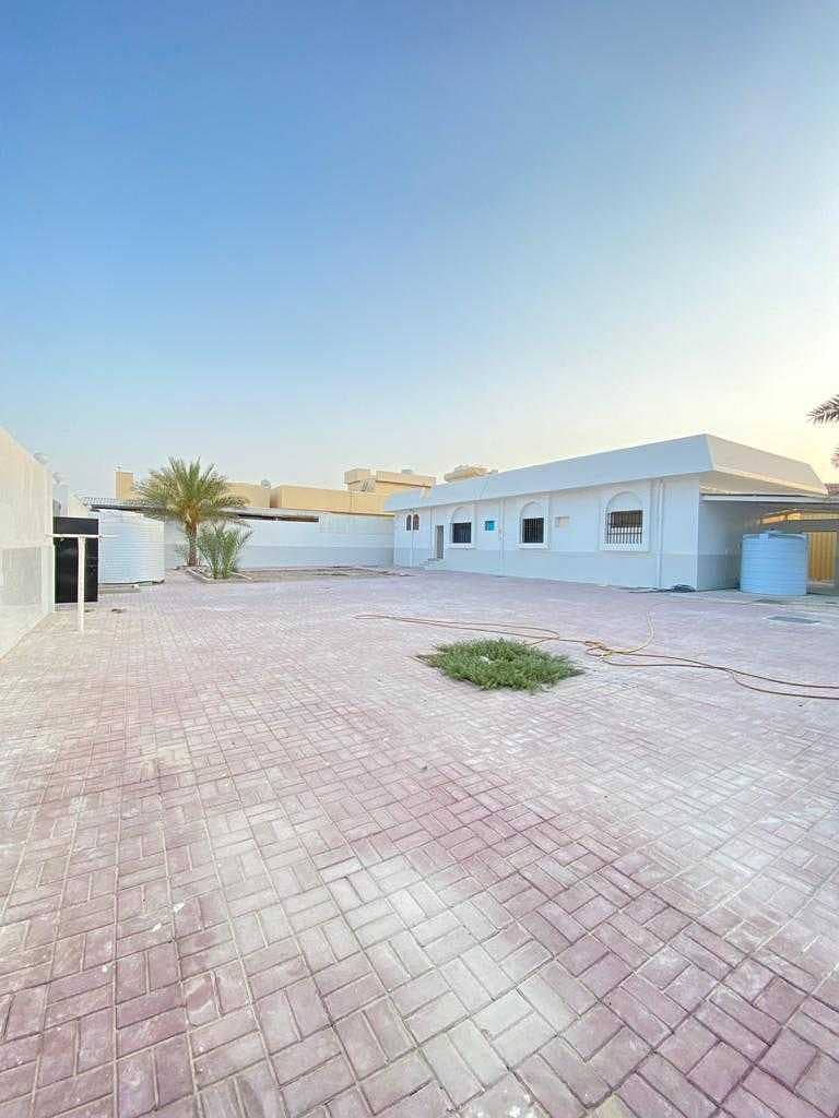 Villa for rent in Ajman, Mushairif area, ground floor, consisting of 4 rooms, a hall, and a hall without air conditioners, opposite a very large monst