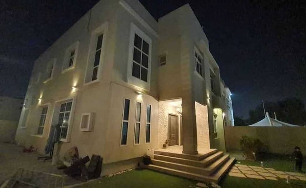 Two-storey villa for rent in Ajman, Al Hamidiya area, very clean, with air conditioners, behind the economic circle