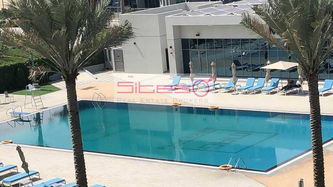 9 Unfurnished 1Bedroom/4 Cheques/Pool view/Near EXPO