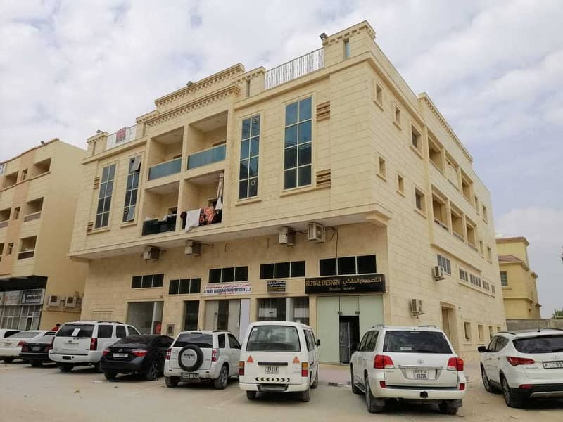 Building for sale in Al Mowaihat area Opposite to Ajman Academy and Choueifat School Building area 10,000 sq age 2 years