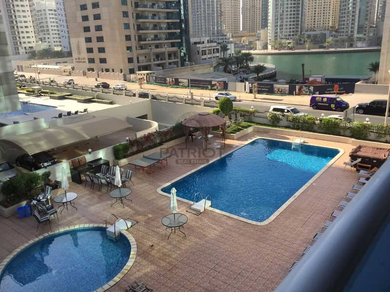 9 One bedroom - pool view and partial marina view