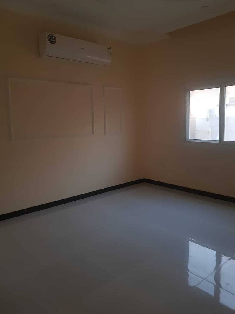 Villa for rent in Helwan, five master rooms, a hall, a large hall, a maid, a spacious kitchen, required 100,000