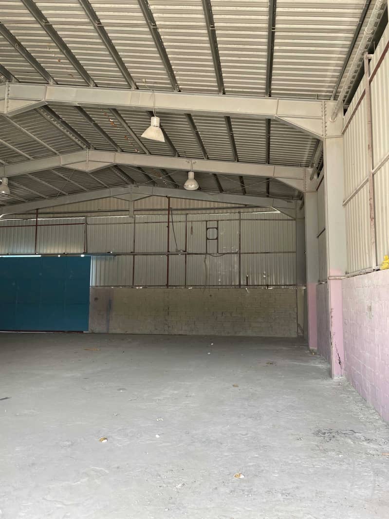 12000 SQ. FT PLOT WITH 7000 SQ. FT WAREHOUSE FOR SALE IN AL JURF AREA