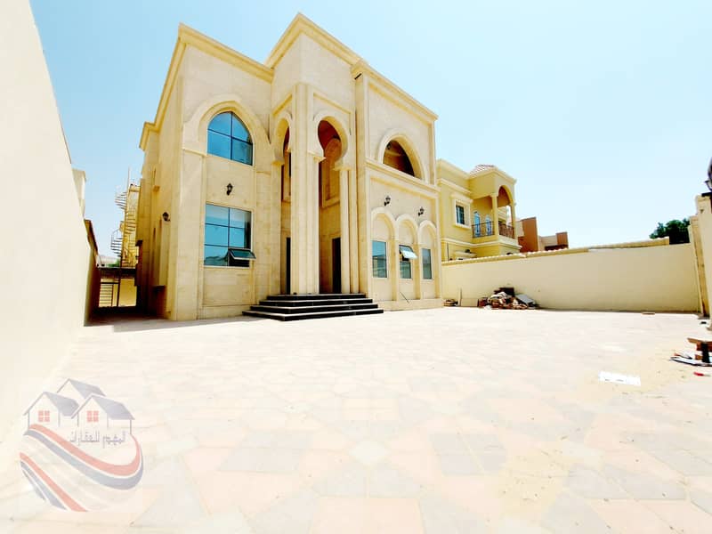 Villa for sale with a stone face, the best European decorations, designs and finishes, very large areas, freehold for life, close to all services,