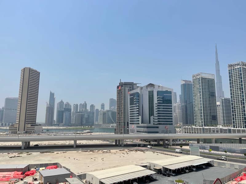 Burj khalifa view |up to 4 chqs |Studio + balcony Burj khalifa view |up to 4 chqs |Studio + balcony