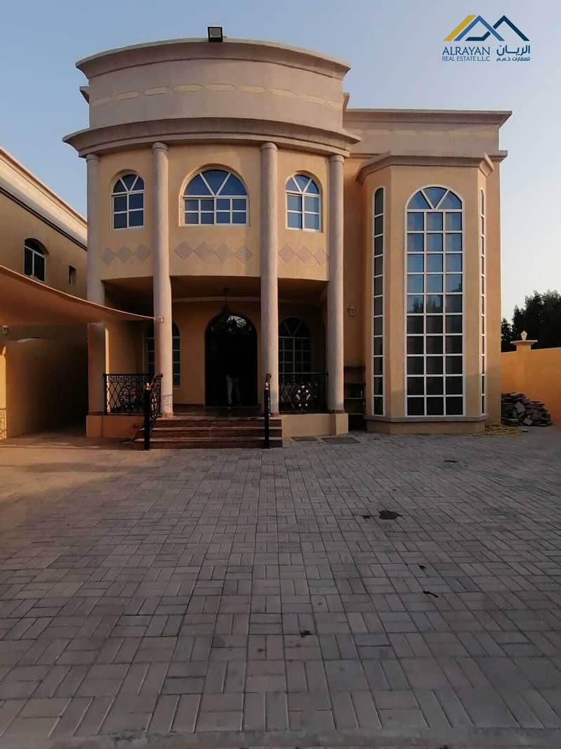 For rent in Al Mowaihat, a two-storey villa, a corner of two streets, very clean