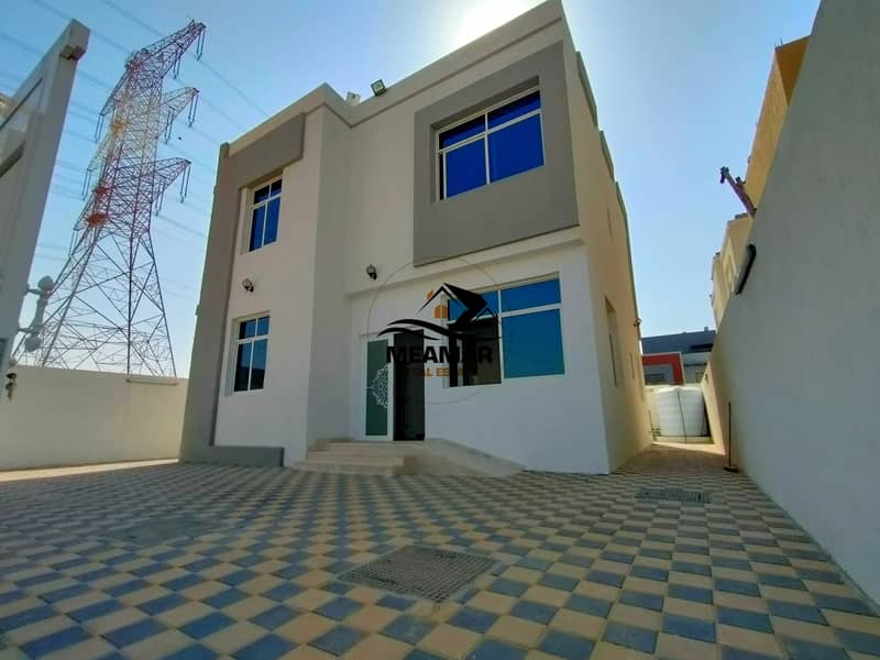 Without down payment, buy a new villa in Ajman, freehold for all nationalities, excellent location and finishing on the highway