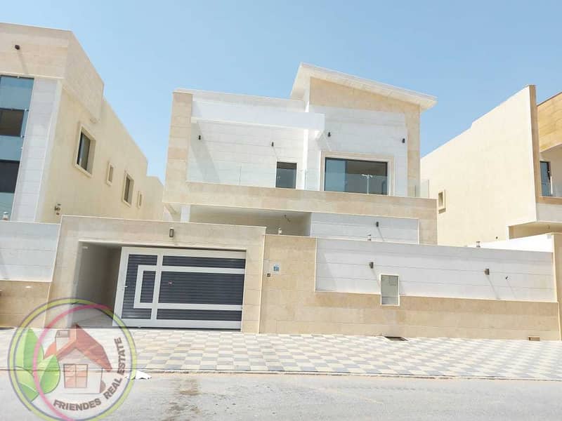 Villa for sale, one of the most luxurious villas in Ajman, personal finishing on the asphalt street, at the price of a snapshot, and super deluxe pers