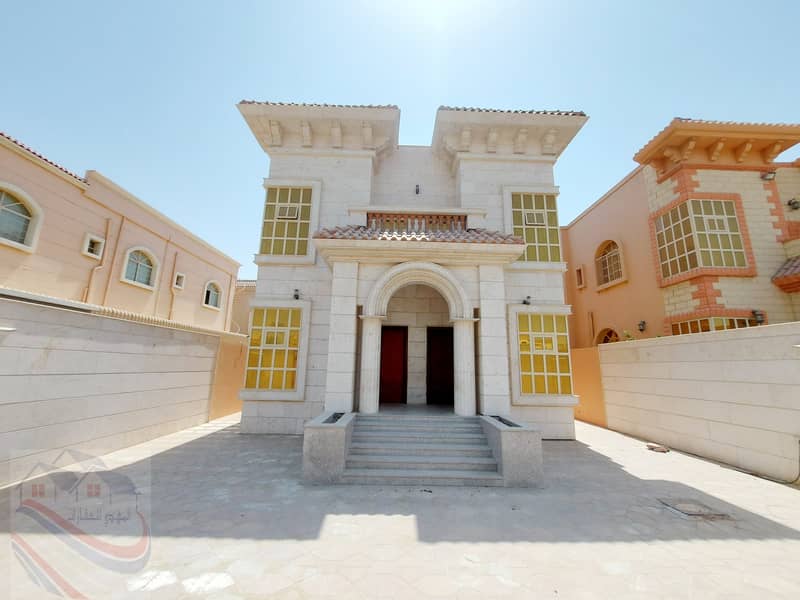 For sale a villa in Ajman with a stone face, electricity and water with air conditioners, at a price of a snapshot, without down payment and on monthl
