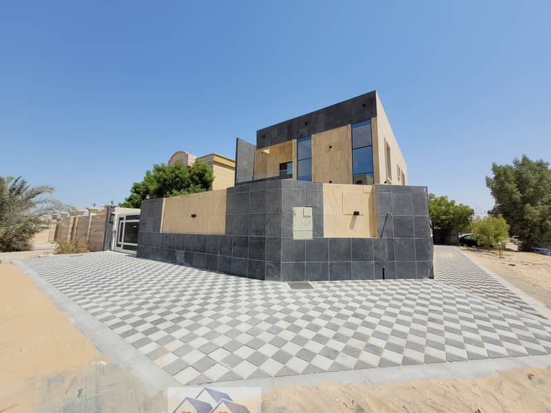 Villa for sale in Al Rawda, Ajman, distinctive European design, freehold, bank financing, corner, near all services, at a negotiable price