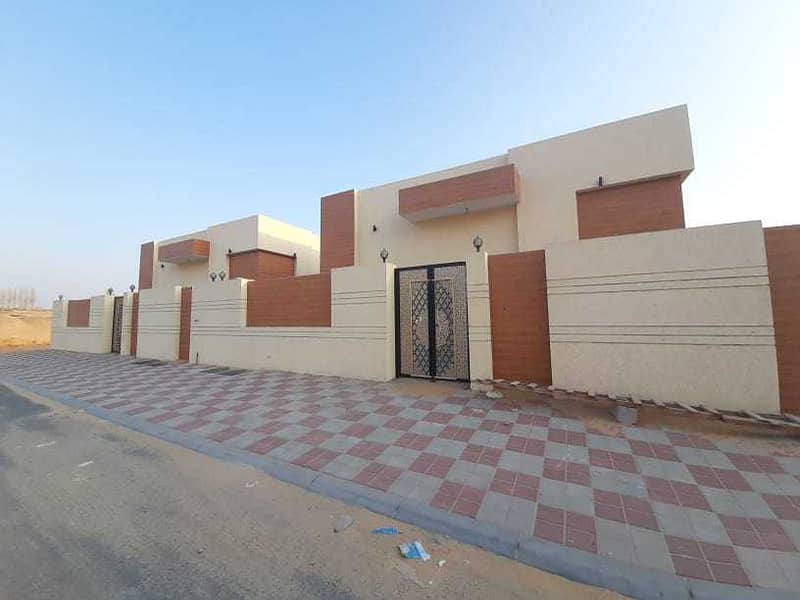 For sale a ground floor villa with high-quality finishes, decorations and raw materials, one of the best villas in Ajman, directly on the neighbor str