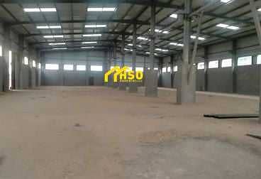 Land for sale in Mussafah on a main street A special corner site built on the sheds and offices