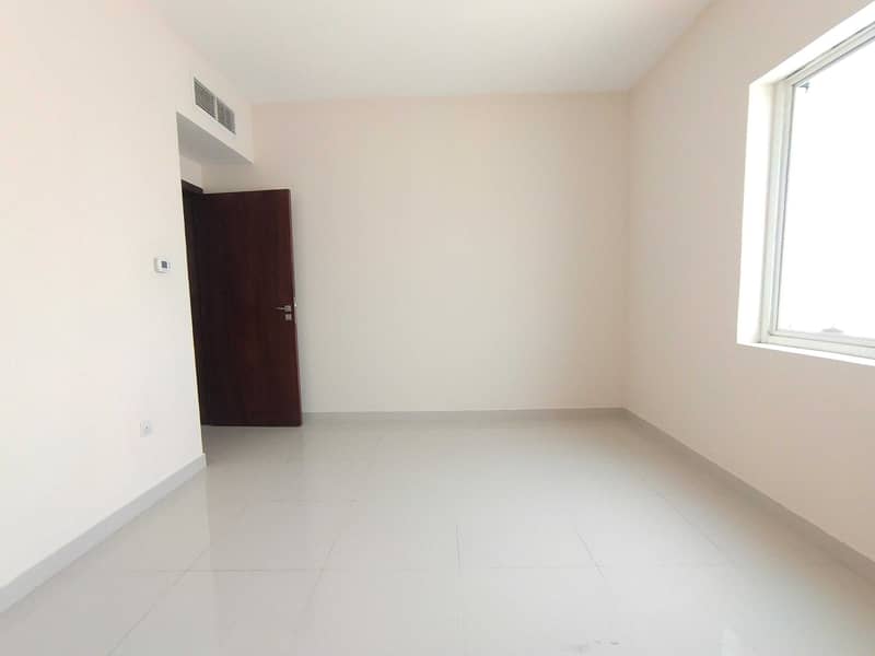 13 Like brand new building 1 month Free 2 Bhk APARTMENT just 30k In Muwaileh Sharjah