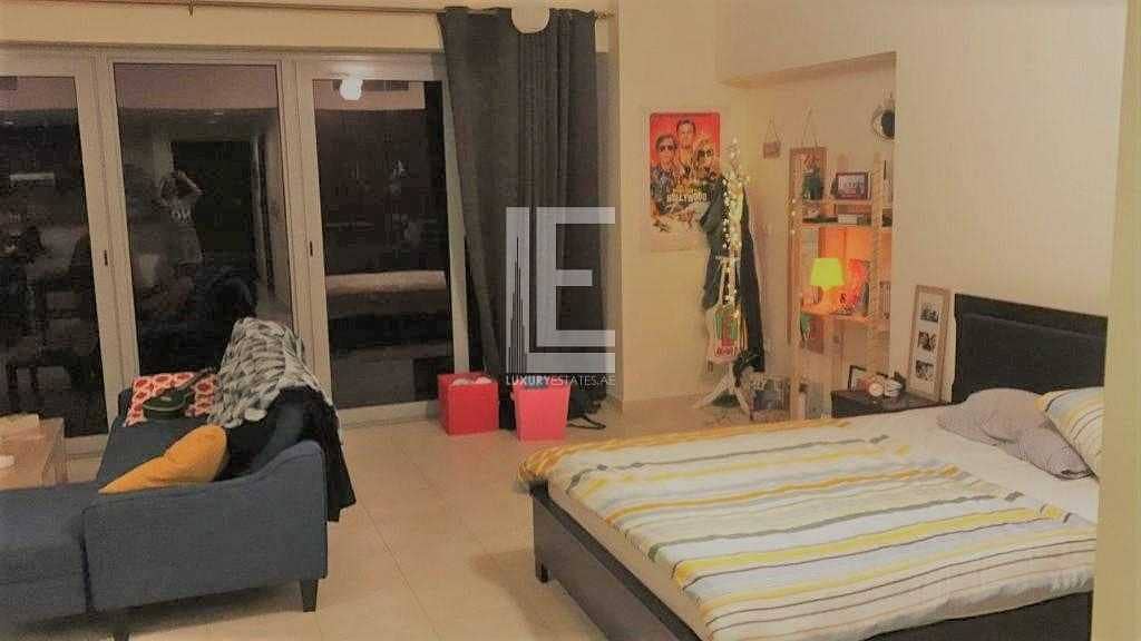Specious (850 SQFT) furnished Upgraded studio with view of Swimming pool & Partial Sea view