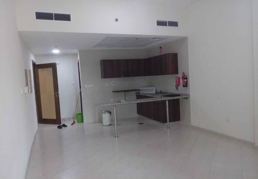 SPACIOUS STUDIO  WITH BALCONY - 4 CHQS - Only 22K AED