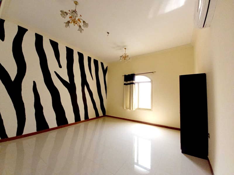villa for sale in Al Mowaihat 2 with swimming pool