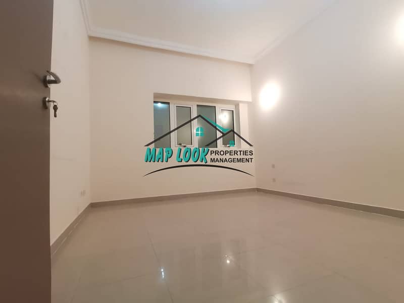 very spacious size 2 bedroom with 2 bathroom balcony in kitchen 50k located opposit main bus terminal al nahyan